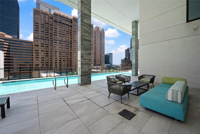 1211 Caroline St Unit 908, Houston, TX 77002 - community pool with a view of city and a patio