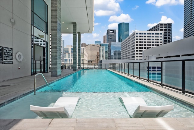 1211 Caroline St Unit 908, Houston, TX 77002 - community pool with a skyline view