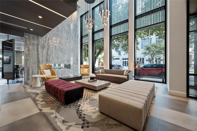 1211 Caroline St Unit 908, Houston, TX 77002 - community lobby with a towering ceiling, expansive windows, and recessed lighting