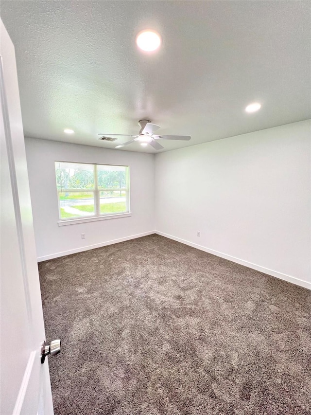 803 Hackberry St, Stafford, TX 77477 - unfurnished room featuring a ceiling fan, dark colored carpet, recessed lighting, and baseboards