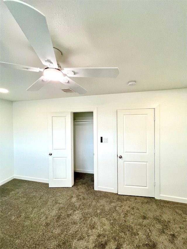 803 Hackberry St, Stafford, TX 77477 - unfurnished bedroom with carpet floors, baseboards, a closet, and a ceiling fan