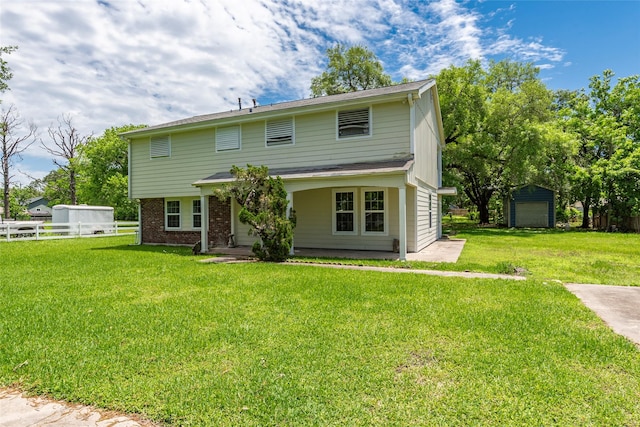 1535 Scott St, La Marque, TX 77568 - view of front of house with an outbuilding and brick siding