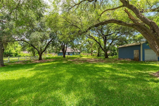1535 Scott St, La Marque, TX 77568 - view of yard with a detached garage