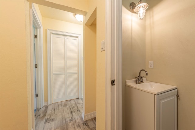 1535 Scott St, La Marque, TX 77568 - bathroom featuring wood finished floors and vanity