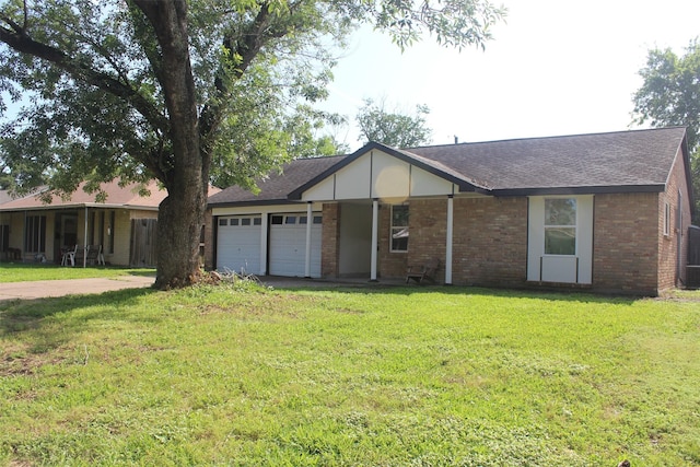 814 Kilpatrick St, Channelview, TX 77530 - ranch-style house with an attached garage, a front lawn, and roof with shingles