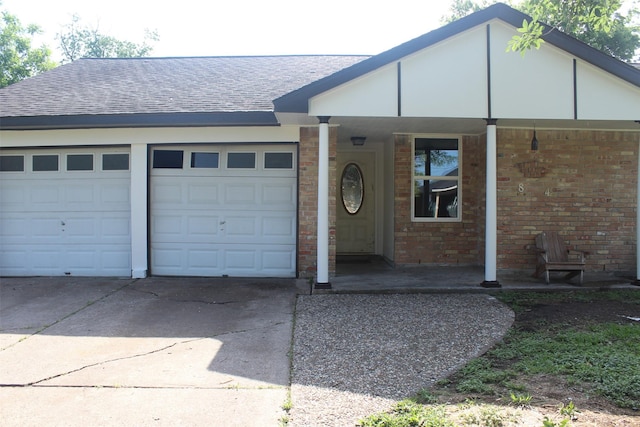 814 Kilpatrick St, Channelview, TX 77530 - view of front of home with driveway, roof with shingles, and brick siding