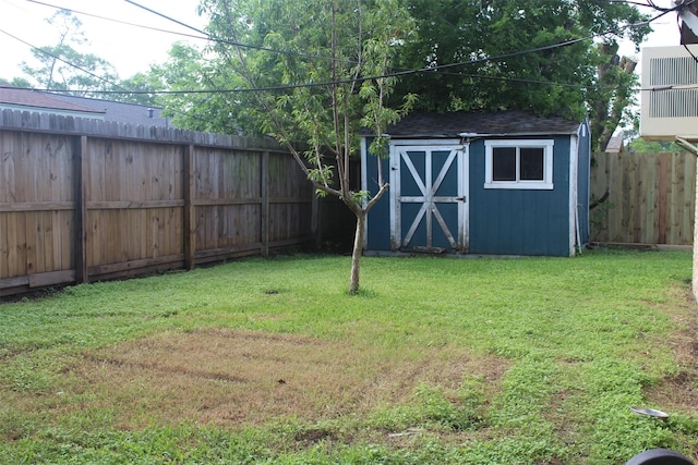 814 Kilpatrick St, Channelview, TX 77530 - view of yard featuring a storage unit and an outdoor structure