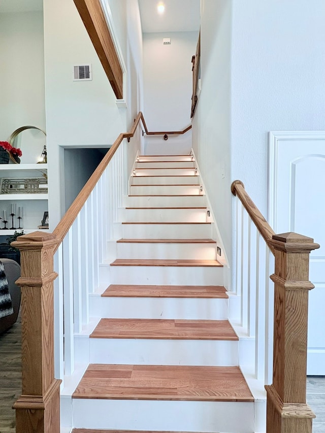 55 Ruskin Dr W, Montgomery, TX 77356 - stairs featuring wood finished floors