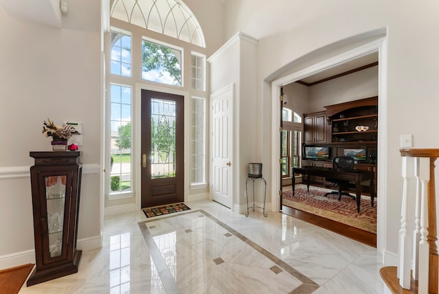 6510 Hoads Deuce Ct, Spring, TX 77379 - entrance foyer with light marble finish floors, baseboards, and a high ceiling