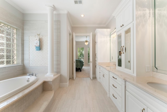 6510 Hoads Deuce Ct, Spring, TX 77379 - bathroom featuring ensuite bath, double vanity, a garden tub, ornamental molding, and recessed lighting
