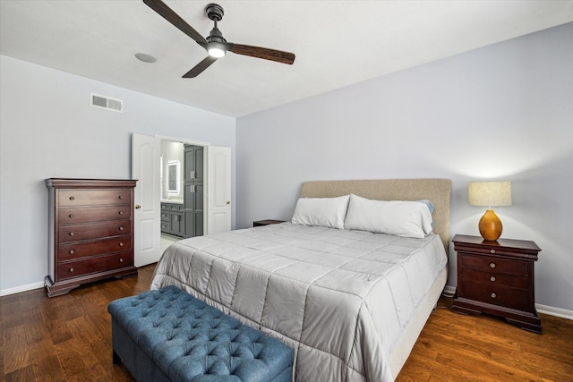 12814 Prestige Row, Houston, TX 77065 - bedroom with wood finished floors, ensuite bathroom, a ceiling fan, and baseboards