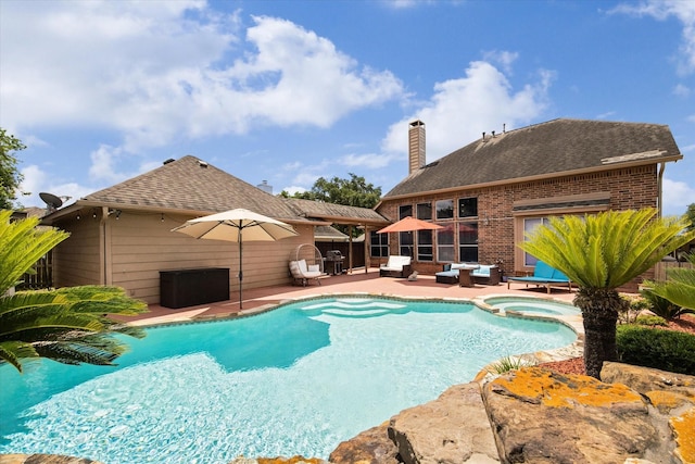 12814 Prestige Row, Houston, TX 77065 - view of pool with an outdoor living space, a patio, a pool with connected hot tub, and grilling area
