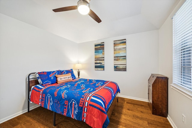 12814 Prestige Row, Houston, TX 77065 - bedroom with wood finished floors, baseboards, and a ceiling fan