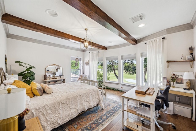 bedroom featuring beam ceiling, an office area, ornamental molding, dark wood-style floors, and a chandelier