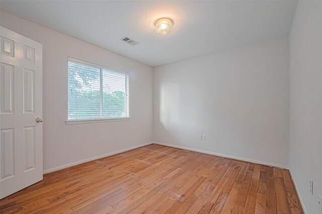 10210 Squirehill Ct, Houston, TX 77070 - unfurnished room featuring light wood finished floors and baseboards