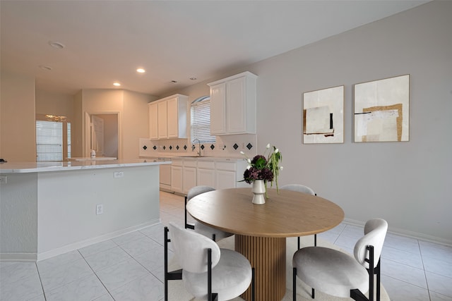 10210 Squirehill Ct, Houston, TX 77070 - dining area with light tile patterned floors, baseboards, and recessed lighting