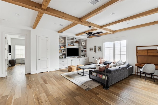2224 N Blvd, Houston, TX 77098 - living area with plenty of natural light, light wood-style floors, beamed ceiling, a ceiling fan, and baseboards