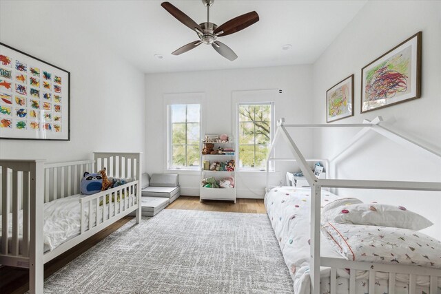 2224 N Blvd, Houston, TX 77098 - bedroom featuring wood finished floors and ceiling fan