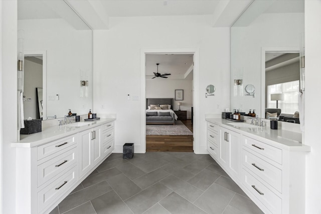 2224 N Blvd, Houston, TX 77098 - ensuite bathroom featuring a ceiling fan, two vanities, and tile patterned flooring