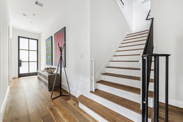 2224 N Blvd, Houston, TX 77098 - stairway with wood-type flooring and baseboards