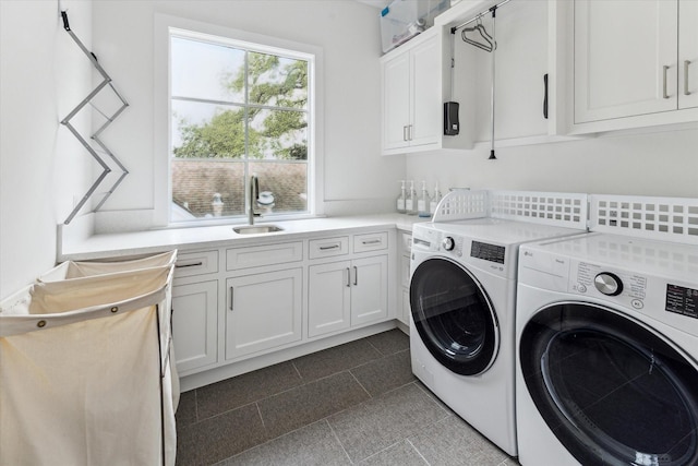 2224 N Blvd, Houston, TX 77098 - clothes washing area with cabinet space and washer and dryer