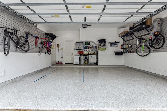 2224 N Blvd, Houston, TX 77098 - garage with a garage door opener and baseboards