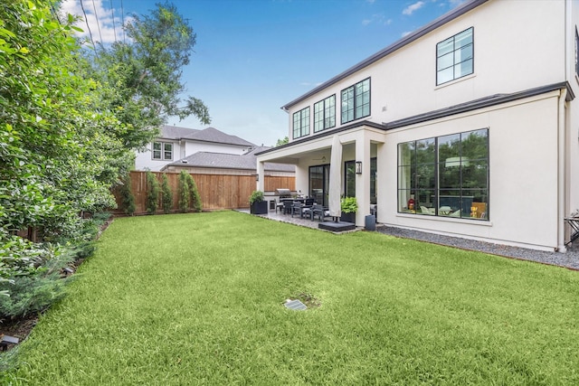 2224 N Blvd, Houston, TX 77098 - back of house with stucco siding and a patio area