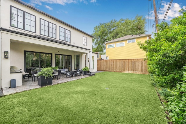2224 N Blvd, Houston, TX 77098 - back of house with an outdoor living space, stucco siding, and a patio area