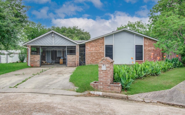 2614 Lemonwood Ln, Houston, TX 77038 - view of front of house featuring fence and brick siding