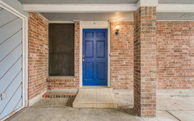 2614 Lemonwood Ln, Houston, TX 77038 - doorway to property with brick siding
