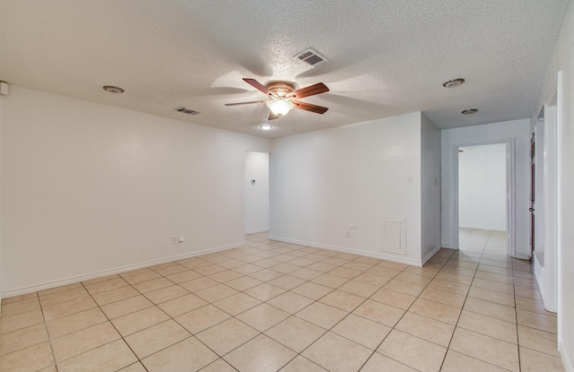 2614 Lemonwood Ln, Houston, TX 77038 - empty room featuring a ceiling fan, a textured ceiling, and baseboards