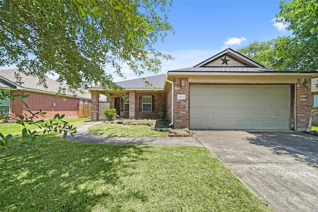 1928 Cypress Ln, Dayton, TX 77535 - ranch-style home featuring driveway, brick siding, an attached garage, and roof with shingles
