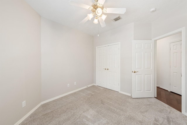 1114 Ridgeburg Ct, Houston, TX 77077 - unfurnished bedroom featuring carpet flooring, baseboards, a closet, and a ceiling fan