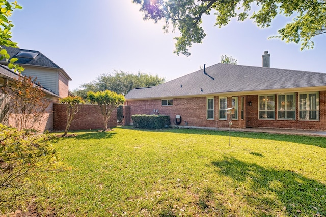 1114 Ridgeburg Ct, Houston, TX 77077 - back of property featuring brick siding, a chimney, and roof with shingles