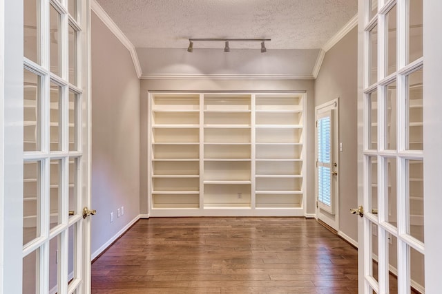 1114 Ridgeburg Ct, Houston, TX 77077 - spare room with french doors, a textured ceiling, ornamental molding, wood finished floors, and track lighting