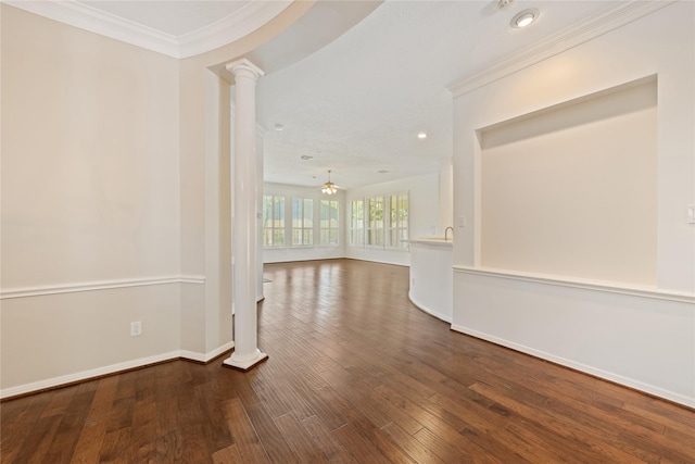 1114 Ridgeburg Ct, Houston, TX 77077 - spare room featuring ornate columns, crown molding, wood finished floors, ceiling fan, and baseboards