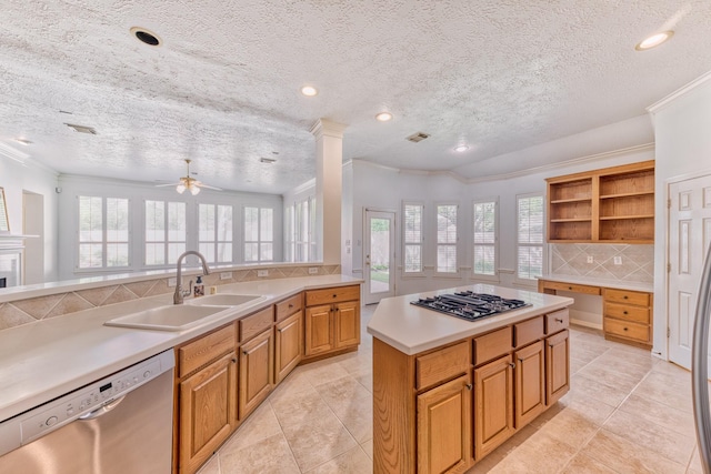 1114 Ridgeburg Ct, Houston, TX 77077 - kitchen with stainless steel dishwasher, gas cooktop, a sink, open shelves, and backsplash