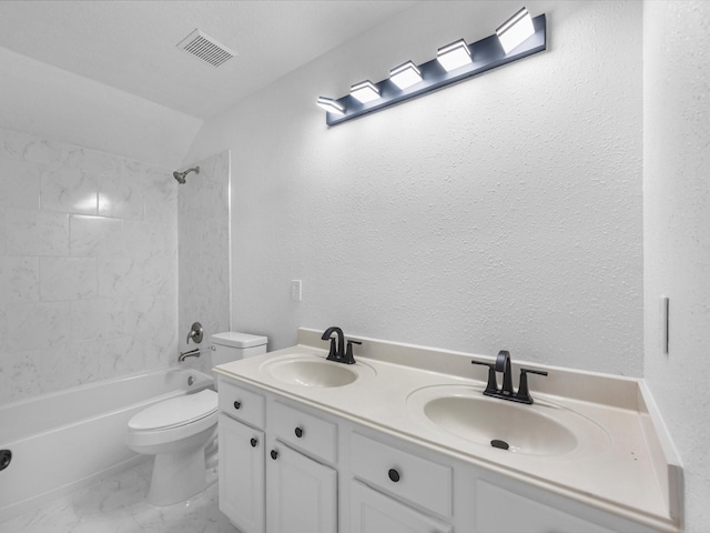 126 Oryan Ct, Houston, TX 77015 - full bath featuring toilet, marble look tiles, double vanity, and shower / washtub combination
