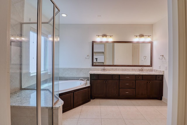 1184 Nelson Falls Ln, Houston, TX 77008 - full bathroom with double vanity, a garden tub, tile patterned flooring, and an enclosed shower