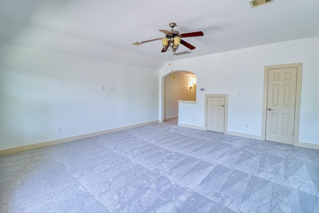 1184 Nelson Falls Ln, Houston, TX 77008 - unfurnished room featuring a ceiling fan, arched walkways, light colored carpet, and baseboards