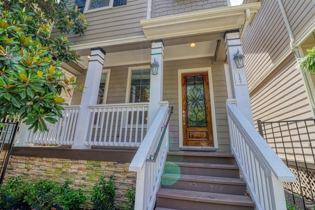 1184 Nelson Falls Ln, Houston, TX 77008 - doorway to property with a porch