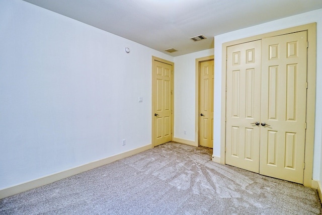 1184 Nelson Falls Ln, Houston, TX 77008 - unfurnished bedroom featuring carpet floors, a closet, and baseboards