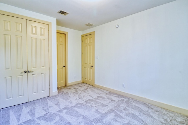 1184 Nelson Falls Ln, Houston, TX 77008 - unfurnished bedroom featuring carpet, baseboards, and a closet