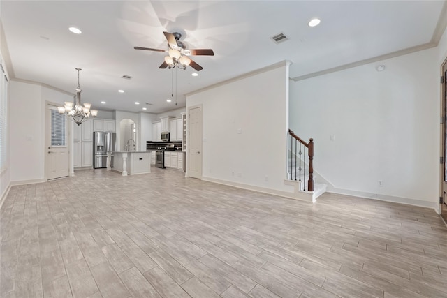 1184 Nelson Falls Ln, Houston, TX 77008 - unfurnished living room with a ceiling fan, a chandelier, baseboards, light wood-type flooring, and recessed lighting