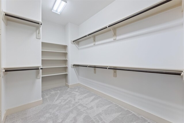 1184 Nelson Falls Ln, Houston, TX 77008 - walk in closet featuring light carpet