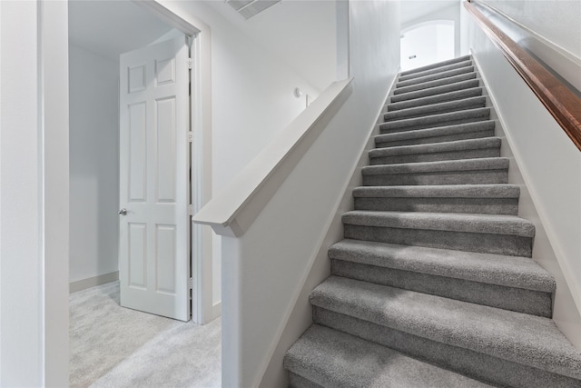 1184 Nelson Falls Ln, Houston, TX 77008 - staircase featuring carpet flooring and baseboards