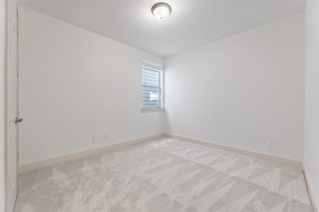 1184 Nelson Falls Ln, Houston, TX 77008 - spare room featuring light carpet and baseboards