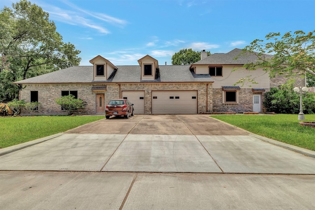 9822 El Chaco St, Baytown, TX 77521 - view of front facade with an attached garage, a front lawn, driveway, and a chimney