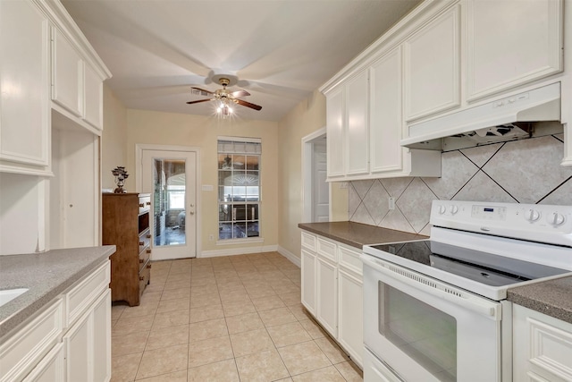 9822 El Chaco St, Baytown, TX 77521 - kitchen featuring white electric range, under cabinet range hood, ceiling fan, and white cabinets