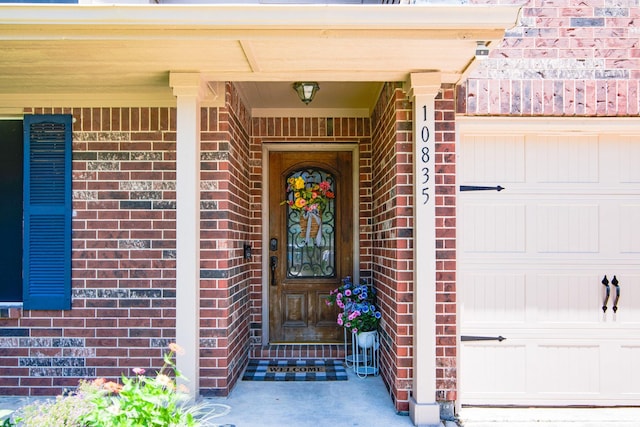 10835 Spruce Dr S, La Porte, TX 77571 - entrance to property featuring brick siding and a garage